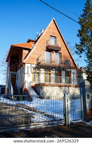 ZAKOPANE, POLAND - MARCH 09, 2015: Villa named Strzelista built in 1929, with historic features listed in the register of architectural heritage