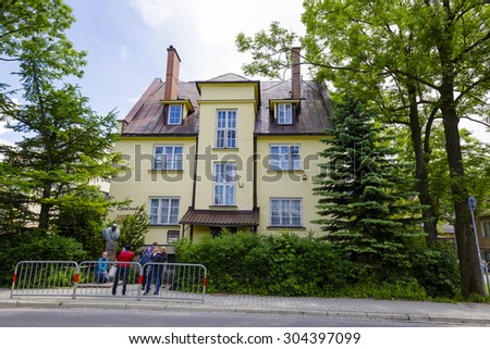 ZAKOPANE, POLAND - JUNE 20, 2015: The villa built with bricks and plastered, named Opolanka, built in 1930, designed by F. Kopkiewicz, entered into the register of monuments
