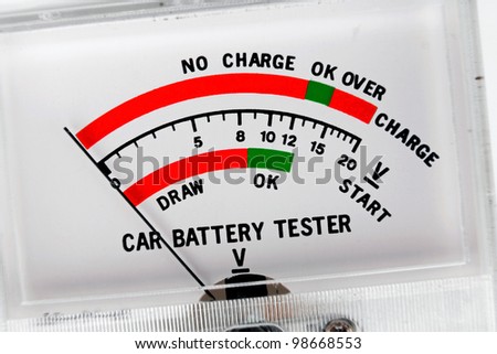 Charging Battery on Photo Car Battery Tester For Measuring The Battery 