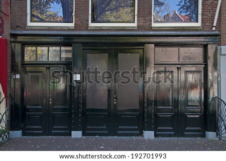 Amsterdam, Netherlands, September 18, 2008: Double doors from the building at Prinsengracht 263 in Amsterdam, which gave access to the warehouse on the ground floor.