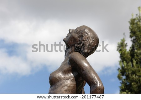 Groningen, The Netherlands: September 17, 2013 - Fragment of bronze sculpture in the garden of estate Borg Verhildersum, Netherlands