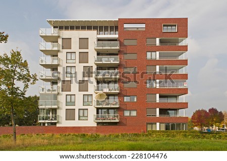 Hoogeveen, Netherlands - September 19, 2014: Modern apartment building in Hoogeveen in evening light, Netherlands