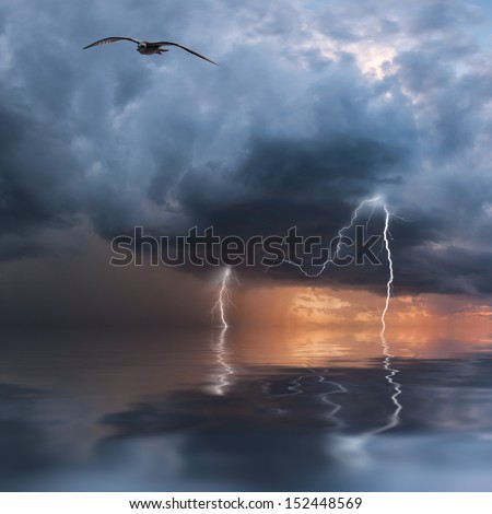 Thunderstorm with rain and lightning over ocean, majestic clouds in the sky