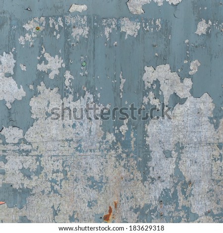 Old scratched texture of rusty metal with paint, background for design