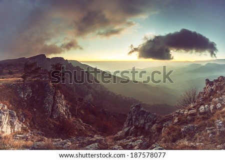 The majestic cloud over the valley, the mountain vintage landscape at sunrise