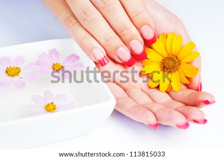 Woman hands with pink manicure. manicure tray