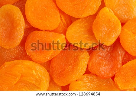 Heap of dried apricots close-up.