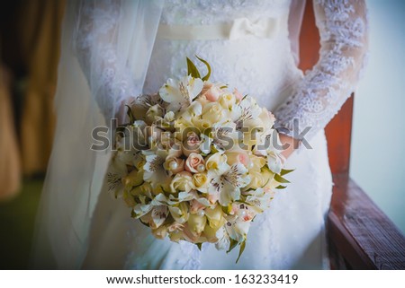 bridal bouquet  in the the bride\'s hands