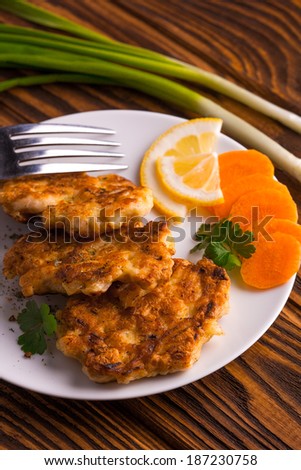 Chicken cutlets in plate, selective focus