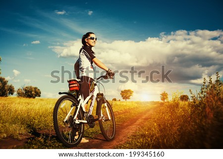 Happy Young Woman riding bicycle outside Healthy Lifestyle Happy Young Woman riding bicycle outside Healthy Lifestyle