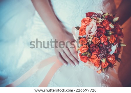 bridal bouquet  in the the bride\'s hands