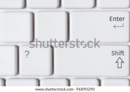 White computer keyboard close-up .