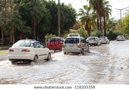 MERSIN - TURKEY - NOVEMBER 09, 2012: A lot of cars drive through flood,  Mersin beach strip 09 November 2012 Mersin - Turkey
