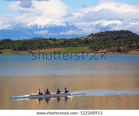 rowing crew in action and autumn