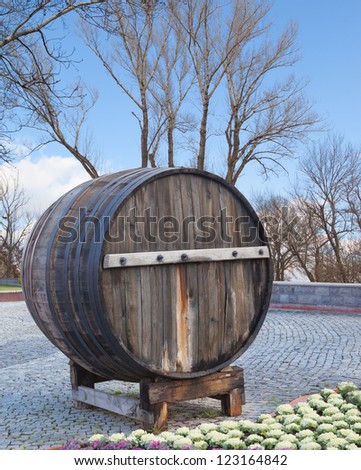 Big wooden barrel with iron rings.