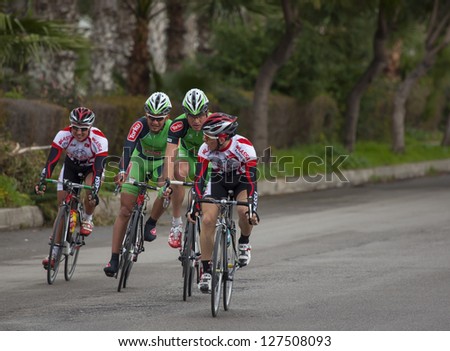 MERSIN, TURKEY - FEB. 08: Cyclists in action during turkey championship,  Cycling Tour of Mersin on Feb. 08, 2013 in Mersin, Turkey.