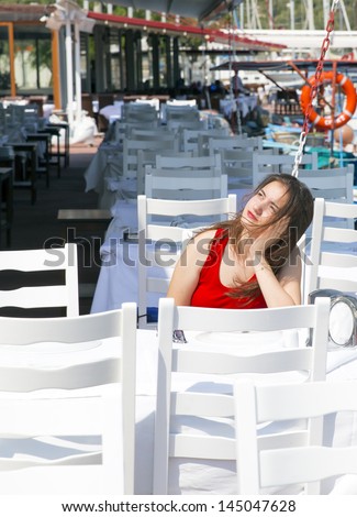Bored Girl Alone at Restaurant