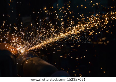 hot sparks at grinding steel material