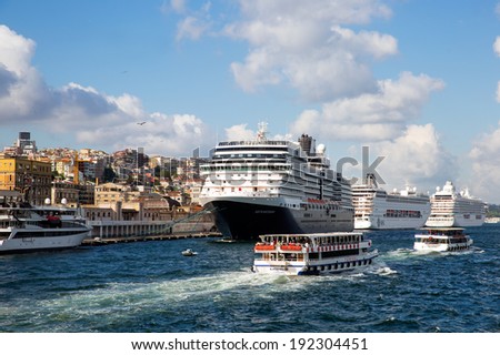 ISTANBUL - MAY 05:  Cruise ships in Eminonu Port on may 05, 2014 in Istanbul,Turkey. The Eminonu port is a major dock for ferryboats in Istanbul.