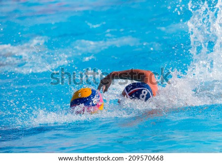 MERSIN JUNE 19:unidentified water polo player in action during the men. 17. Mediterranean Games match between Italy and France, final score 9 - 6. June 19 , 2013 in Mersin Turkey
