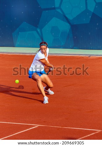 MERSIN - JUNE 24: Sakkari Maria of Greece in her third round loss to Di Sarraf Italy at the 2013 Mediterranean Games on June 24, 2013 in Mersin, Turkey