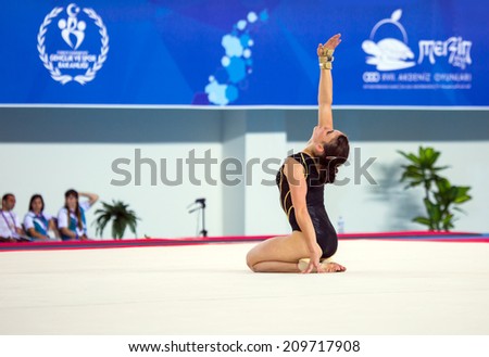 MERSIN, turkey - JUNE 21:  Saca Golob , Slovenia performs on the Floor Exercise  International Tournament in Artistic Gymnastic Mediterranean games Mersin, Turkey on June 21, 2013