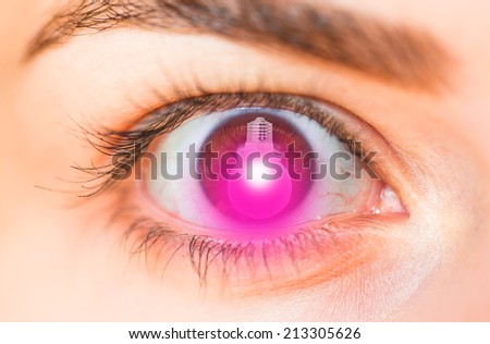 woman having an idea with light bulb in her eye