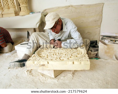 MARDIN - TURKEY - JUNE 27 : Stonemason, Hands detail of craftsman at work with Hammer and chisel on June 27 2009 in Mardin Turkey