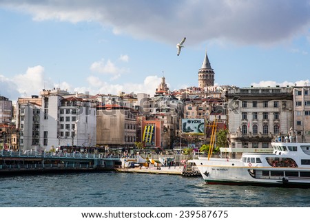 ISTANBUL, MAY 06: The Galata Tower with apartments and sea around. 06 May 2014 in Istanbul, Turkey