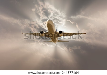 passenger airplane in the clouds. travel by air transport