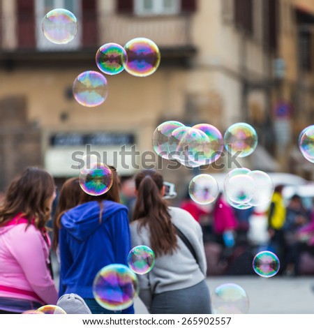 Movement bubbles floating in the air, Basilica of santa Croce , Florence italy