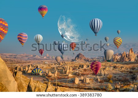 Hot air balloon flying over spectacular Cappadocia \