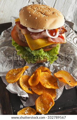 Homemade burger with sweet potato chips
