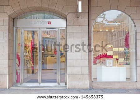Geneva - March 24: A Retail Outlet For Swatch On March 24, 2013 In Geneva, Switzerland. On March 1, 1983, 30 Years Ago, The First 12 Swatch Models Made Their Debut.