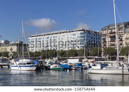 GENEVA Ã¢Â?Â? OCTOBER 17: The 5 star Grand Hotel Kempinski October 17, 2013, Geneva, Switzerland. It has 398 rooms and a 1,300-seat theater. Kempinski Hotels operates 75 five-star hotels in 30 countries.
