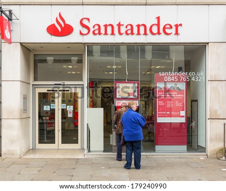 LONDON, ENGLAND -Ã?Ã? DECEMBER 14, 2013: A Santander Bank branch.  Santander is the largest bank in the eurozone and one of the largest in the world with market capitalization of 63 billion euros.