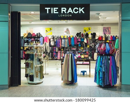 LONDON, ENGLAND - DECEMBER 15, 2013: A Tie Rack store in Heathrow. Tie Rack is reported in November 2013 to begin closing its 44 UK stores, threatening the loss of up to 200 jobs.