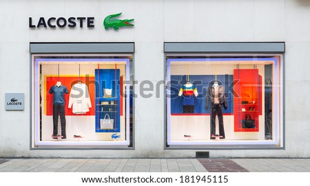 GENEVA, SWITZERLAND -Â?Â? MARCH 16, 2014: A retail outlet for LACOSTE. Lacoste is a French apparel company that sells high-end clothing, most famously tennis shirts.