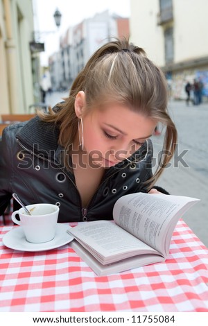 The female student in cafe street in old city