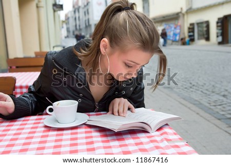 The female student in cafe street in old city