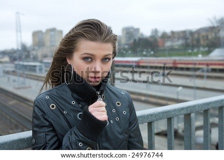 young woman on train station