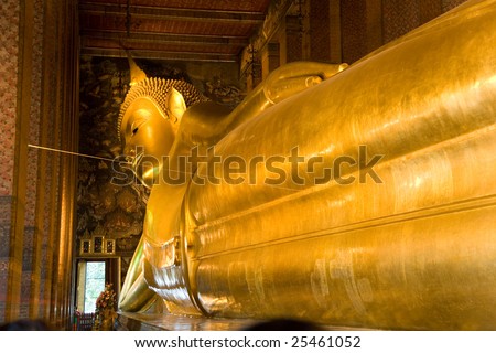 The reclining Buddha at Wat Pho in Bangkok, Thailand. Largest reclining Buddha in the world.
