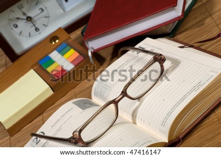 Organizer, pen, books. Financial concept