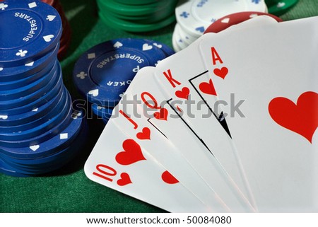 Royal flush of spades and chips