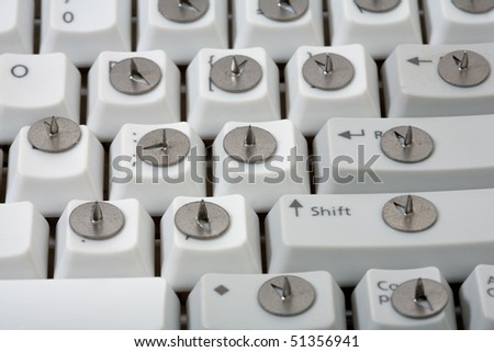 Traditional business concept.  drawing pin and keyboard