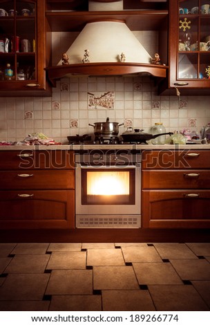 Interior photo of country style kitchen with hot oven
