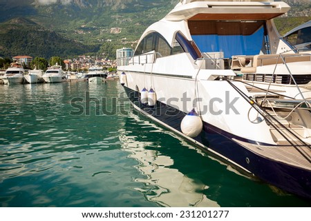 Beautiful view of luxurious white yacht moored at sea bay