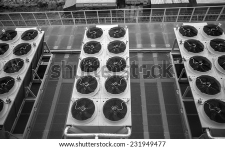 Black and white photo of long rows of air conditioning systems