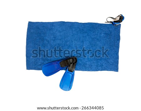 Isolated photo of flippers and snorkeling mask lying on blue beach towel