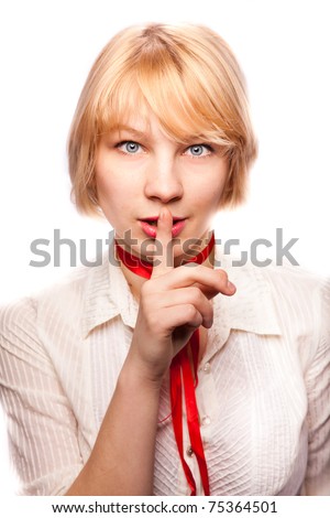 stock photo Young blonde model holding finger near mouth